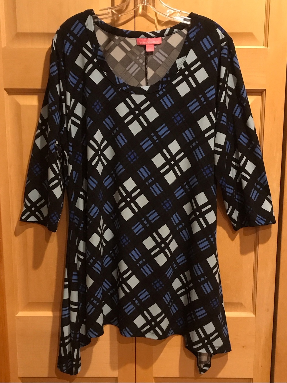 Woman Within Black Plaid Tunic with Blue and Light Blue Checks